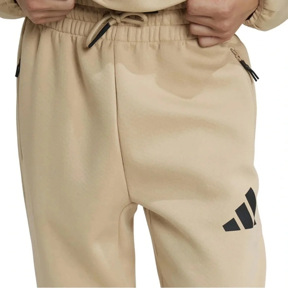 Adidas ZNE boys size XL cream black Sweatpants Prime knit zip jogger Pockets $70